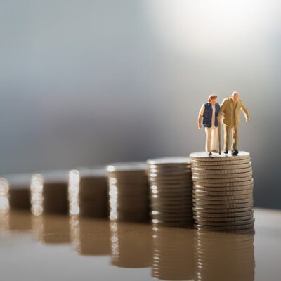 Pension couple climbing coins